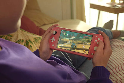 Nintendo Switch Lite Coral NINTENDO