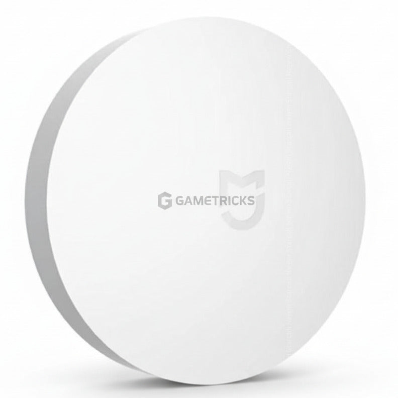 White round device with a logo on a white background