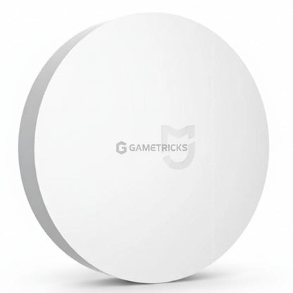 White round device with a logo on a white background