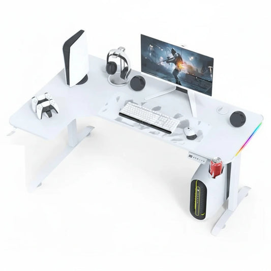 White L-shaped gaming desk with RGB lighting, computer setup, and gaming accessories on a white background.