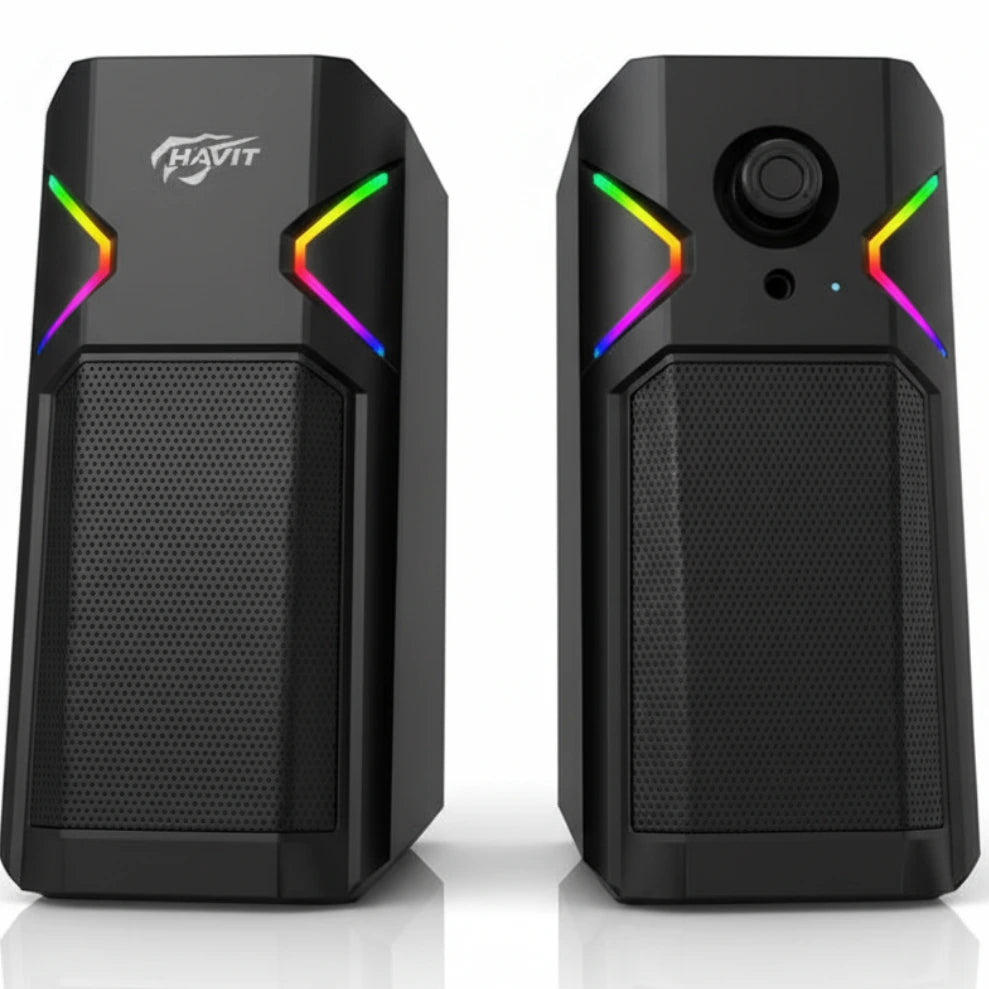 Black computer speakers with RGB lighting on a white background