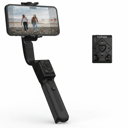 Handheld phone stabilizer with smartphone displaying a beach scene, next to a remote control on a white background.