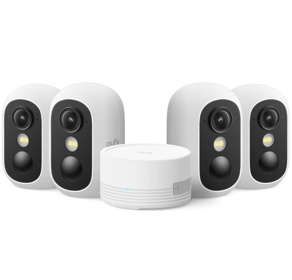Set of four security cameras and a central hub on a white background